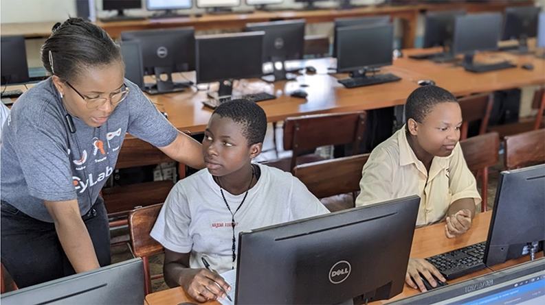 students typing on computers